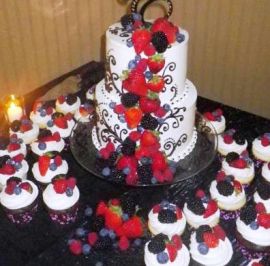 R & C - Fresh fruit topped cupcakes and fruit cascae on rounds.jpg